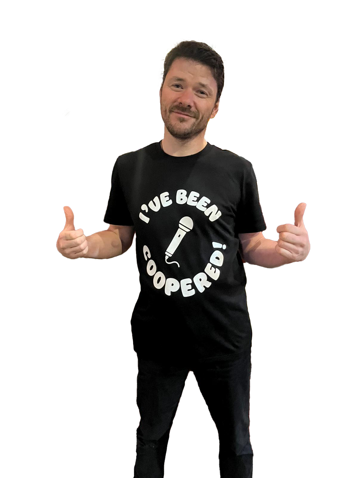 A man facing the camera with a cheerful expression, giving a thumbs-up gesture. He is wearing a t-shirt that says 'I've been coopered!' with a microphone graphic in the center.